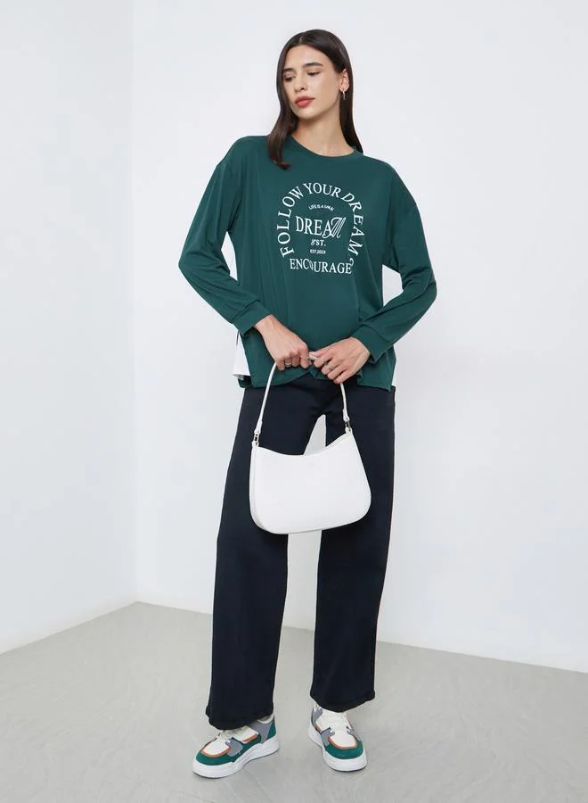 ستايلي تيشيرت واسع بطبعة كتابة