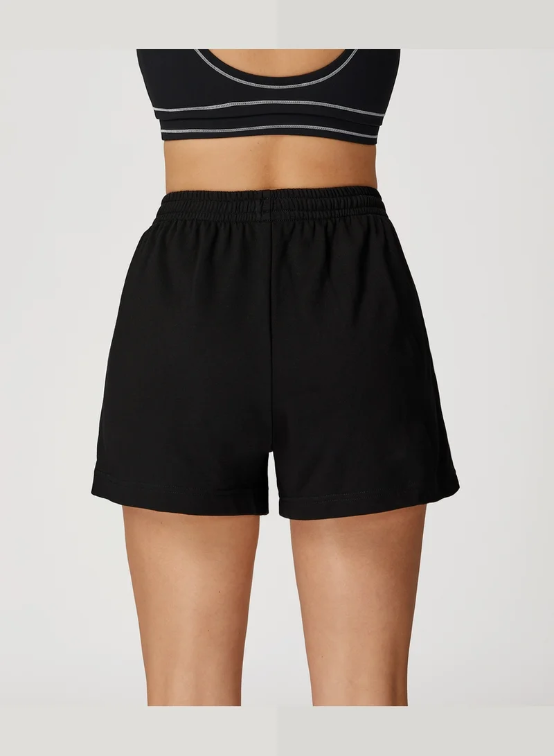 KAWN.YOGA Licorice Black High Waist Loose Fit Shorts for Women | Best Price UAE