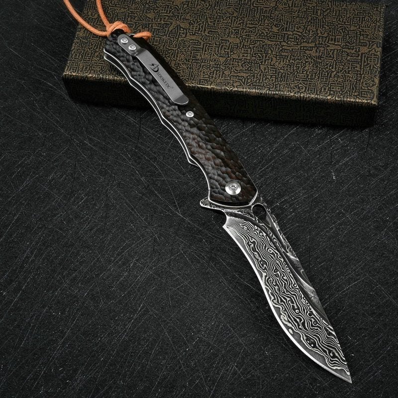 Damascus Folding Knife: 67-Layer Japanese Damascus Steel VG10 Core 60–61HRC, Hand-Carved Black Ebony Handle, One-Handed Ball Bearing Deployment - Secure Liner Lock, Low-Profile Pocket Clip for EDC, Ou - Image 3