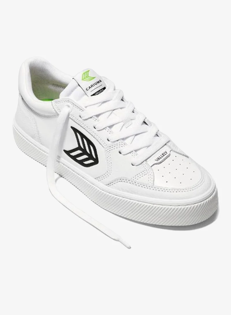 كاريوما فاليلي جلد أبيض بشعار أسود