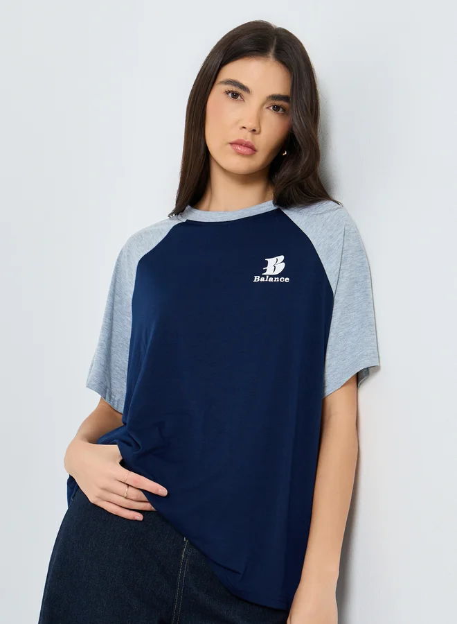تايك تو Take Two Slogan Print Raglan Sleeve Oversized T-Shirt