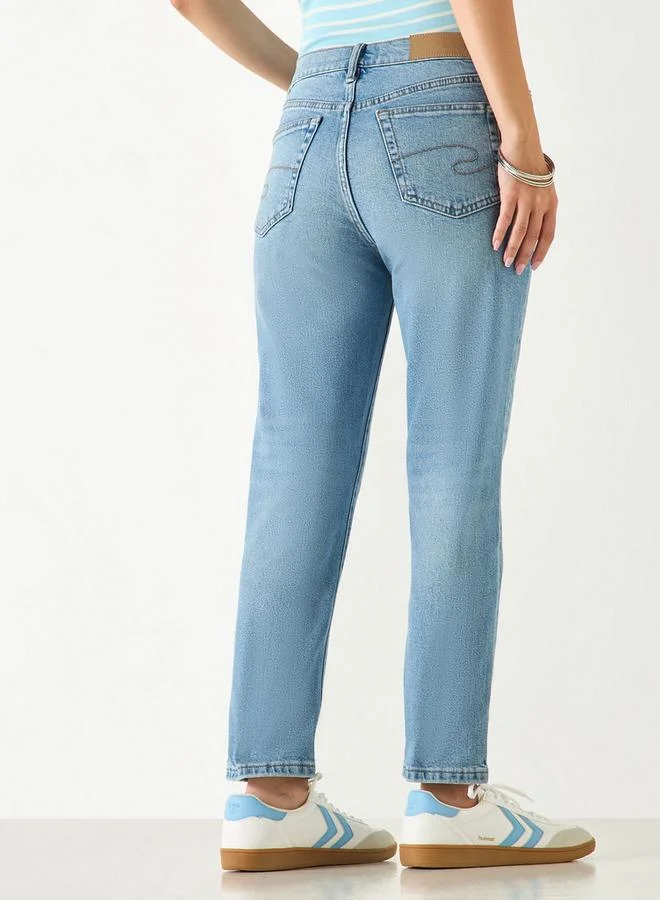 لي كوبر بنطلون جينز سادة بقصّة عادية وجيوب من لي كوبر