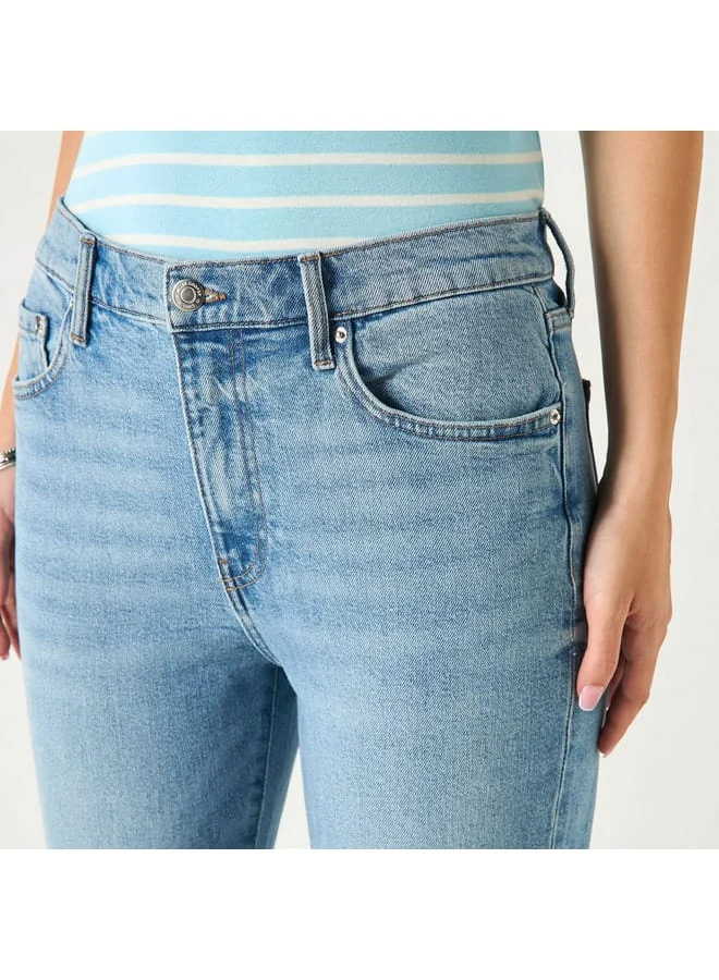 لي كوبر بنطلون جينز سادة بقصّة عادية وجيوب من لي كوبر