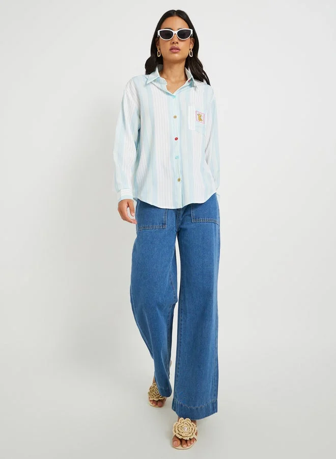 تايك تو قميص فضفاض مطرز بخطوط وجيب