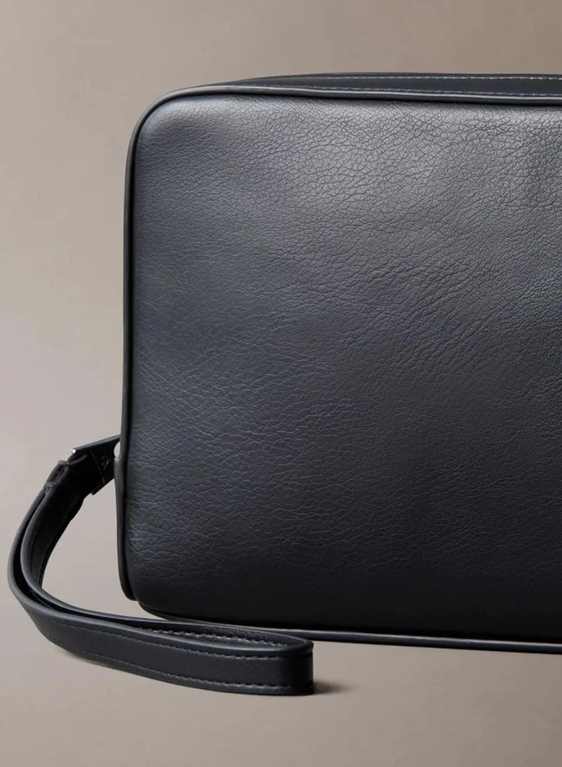 Calvin Klein Black Embossed Monogram Leather Pouch for Men | Best Price UAE