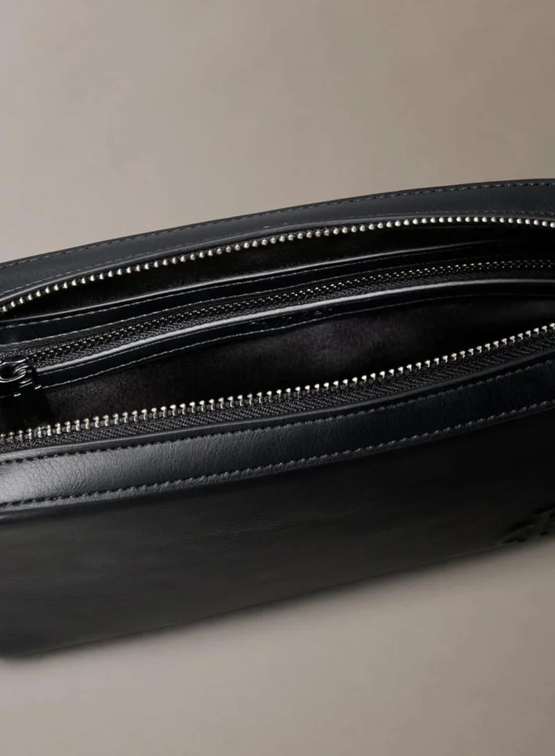 Calvin Klein Black Embossed Monogram Leather Pouch for Men | Best Price UAE