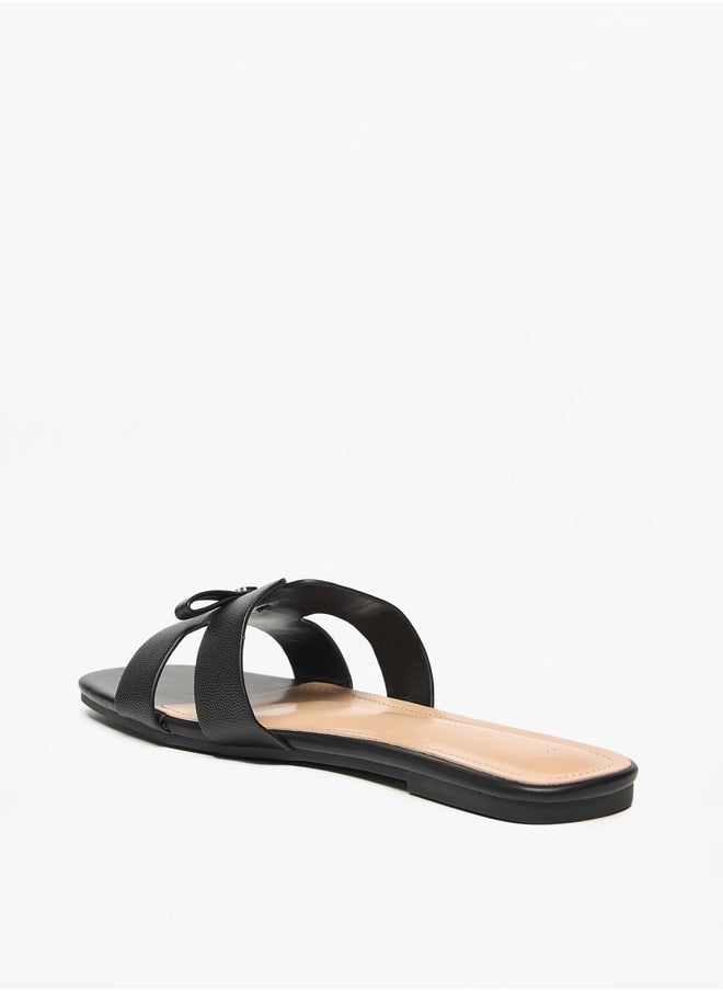 Flora Bella By Shoexpress - Monogram Print Slip-On Sandals with Bow Applique - Image 1