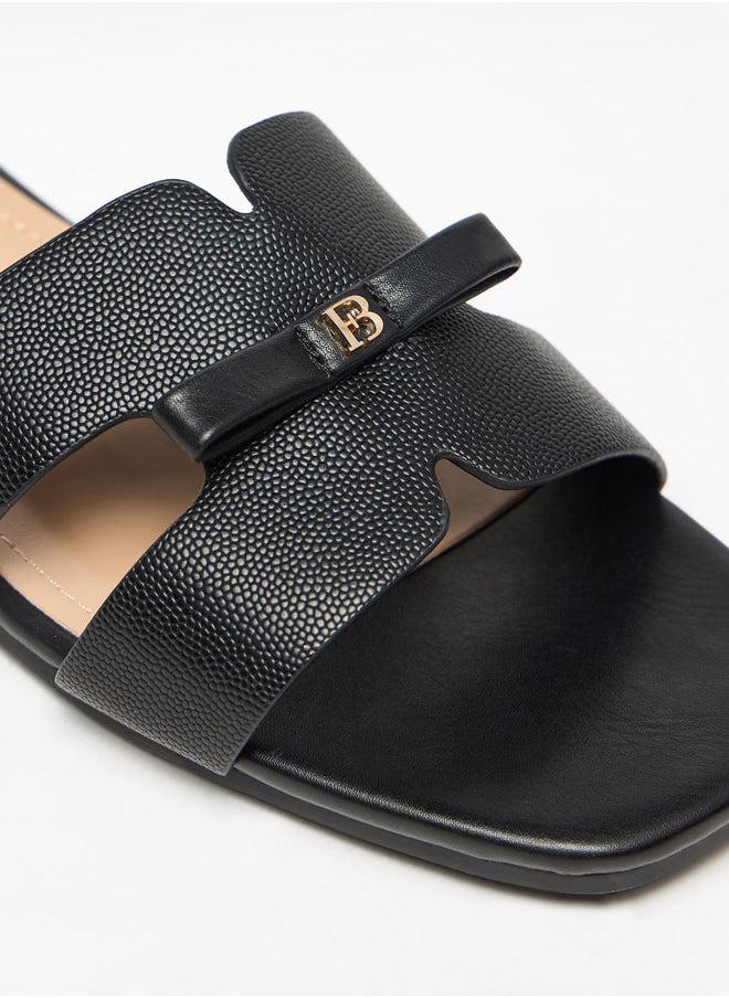 Flora Bella By Shoexpress - Monogram Print Slip-On Sandals with Bow Applique - Image 1
