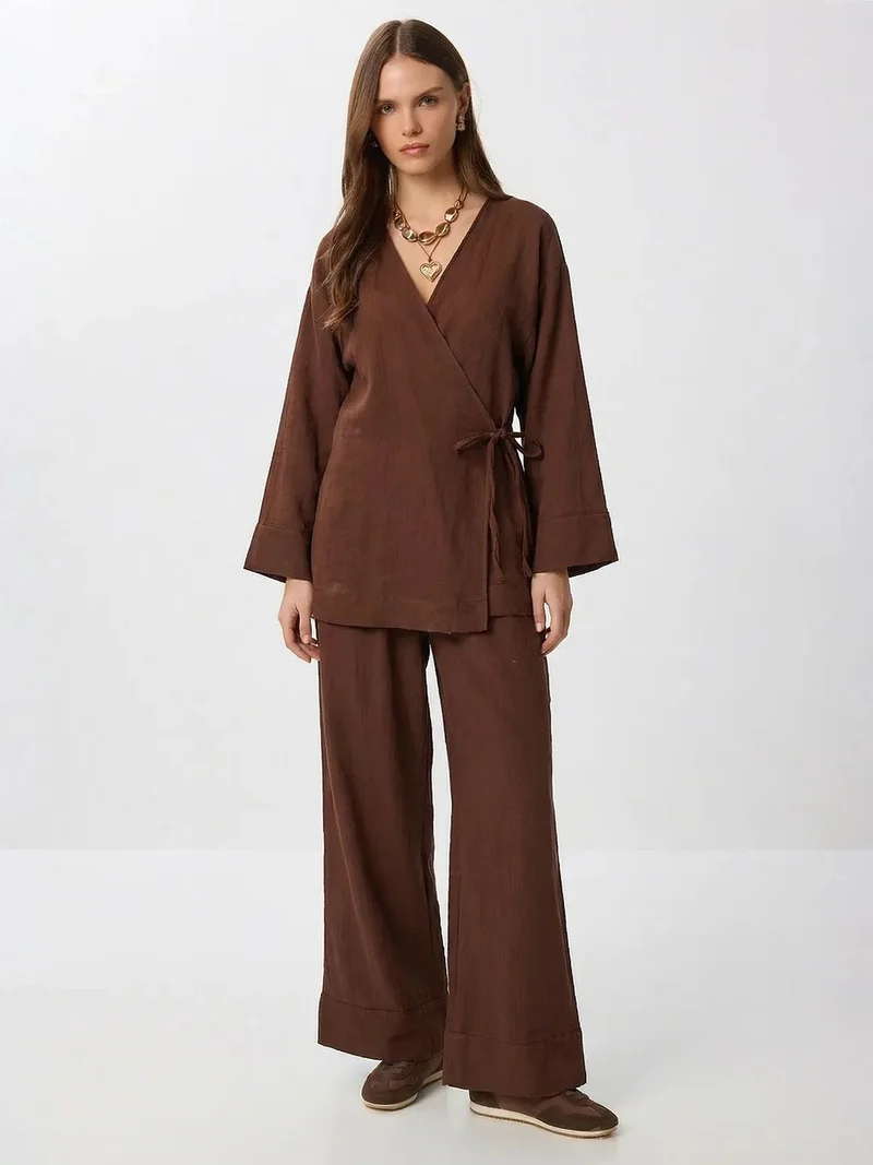 السعادة في إسطنبول ISTANBUL High Waist Wide Leg Pants & V-Neck Tie Detail Blouse Co-ord Set