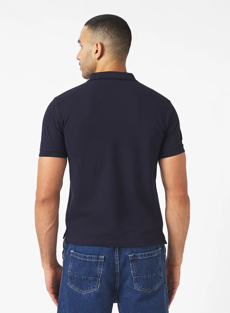 سفنتي فايف قميص بولو بأزرار