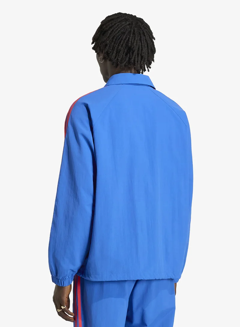 اديداس اوريجينالز جاكيت مدرب بثلاث خطوط