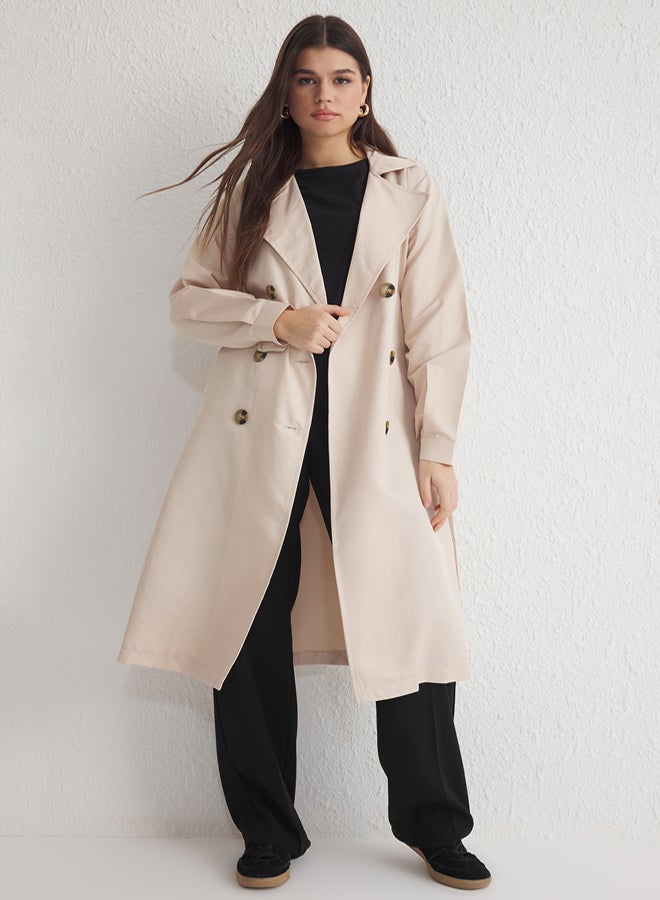 trendyol معطف ترنش طويل مقاوم للماء بلون البيج مع حزام - Image 1