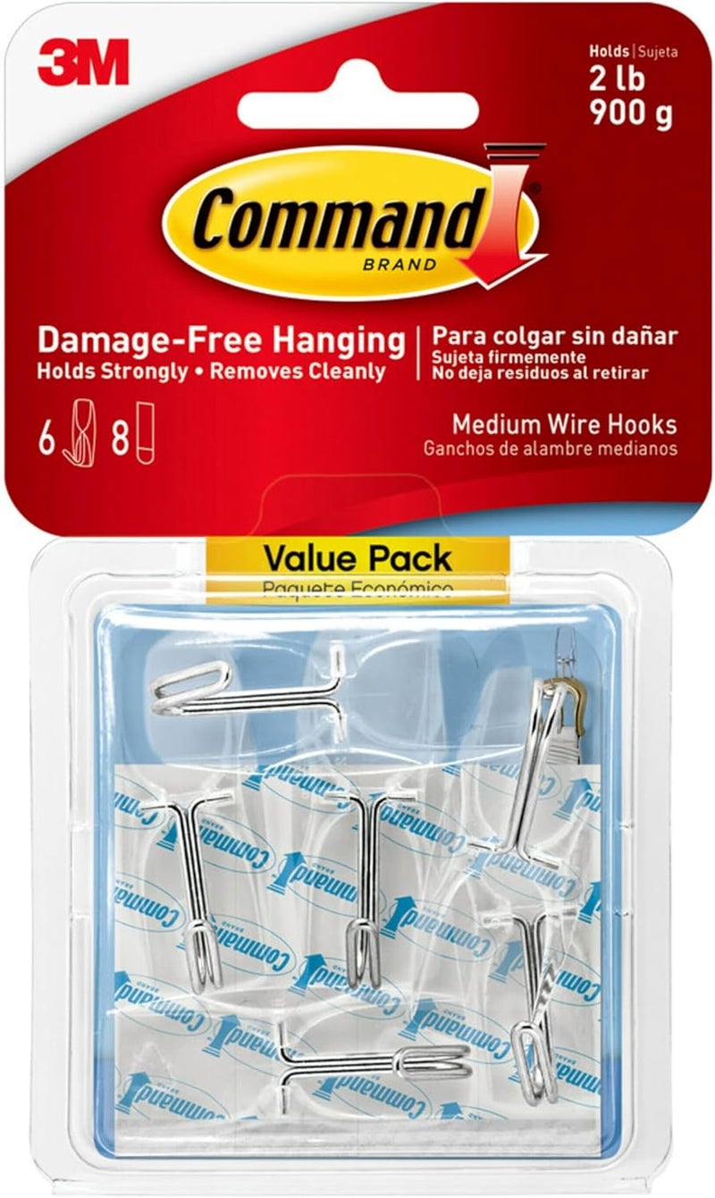 Command Medium Clear Wire Toggle Hooks, 6 Hooks and 8 Strips, Damage-Free Hanging Wall Hangers for Hanging Christmas Decorations, Holds up to 2 lb - Image 1