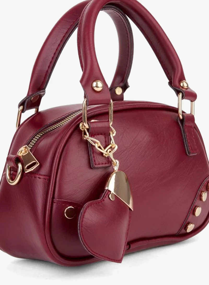 Women's Crimson Burgundy Heart Charm Detailed Adjustable Strap Zipper Closure Hand, Arm and Shoulder Bag.