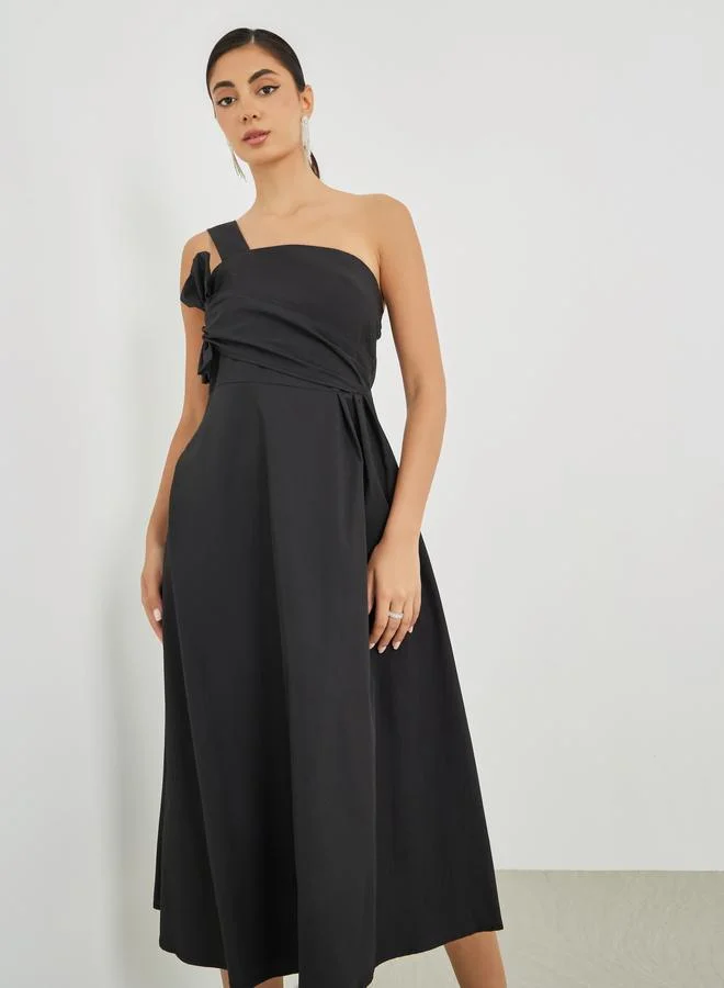 Styli Plain One Shoulder A-Line Midi Dress with Bow Detail