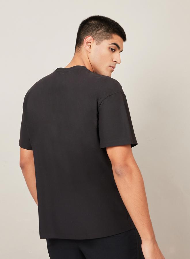 Styli Micro Pique Knit Oversized T-Shirt with Reflective Logo  - Image 4
