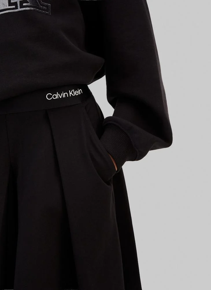 Calvin Klein Jeans Ck Black Youth Logo Tape Mini Skater Skirt for Women | Best Price UAE