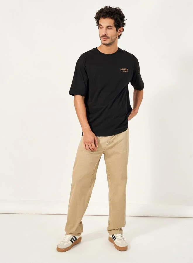 Styli Active Oversized Slogan Print Round Neck T-Shirt