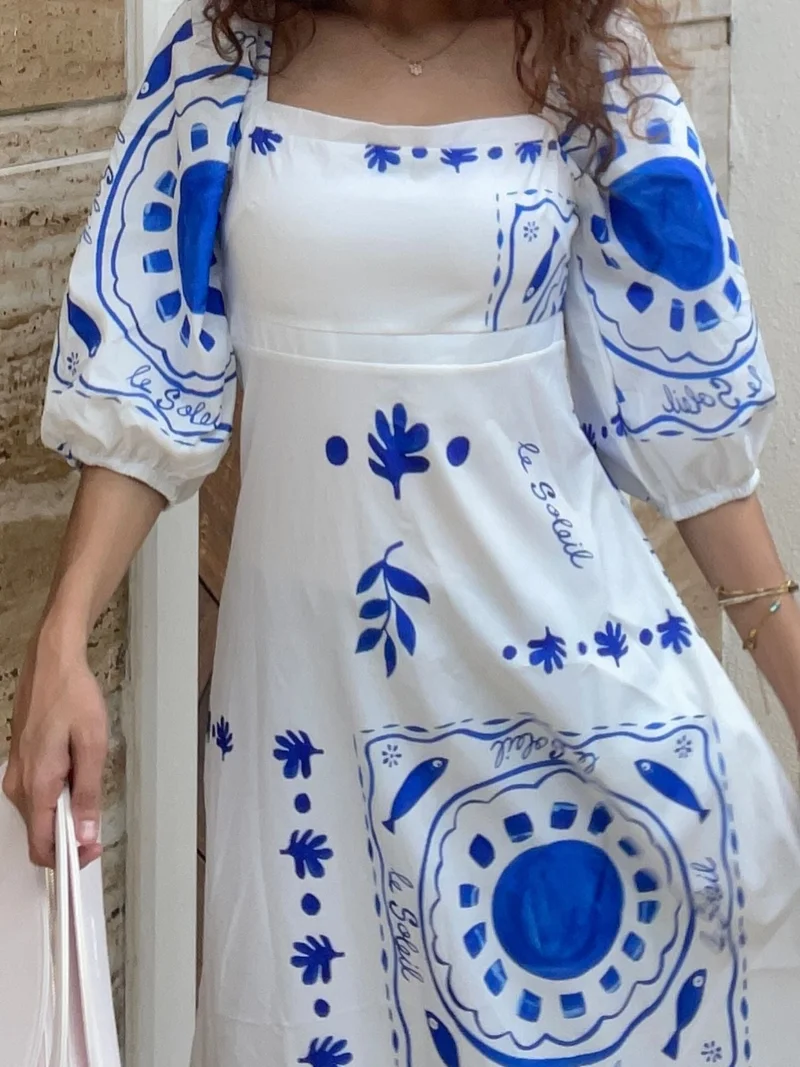 Outzidr  White Square Neck Fit And Flare With Hem Ruffle Maxi Dress for Women | Best Price UAE