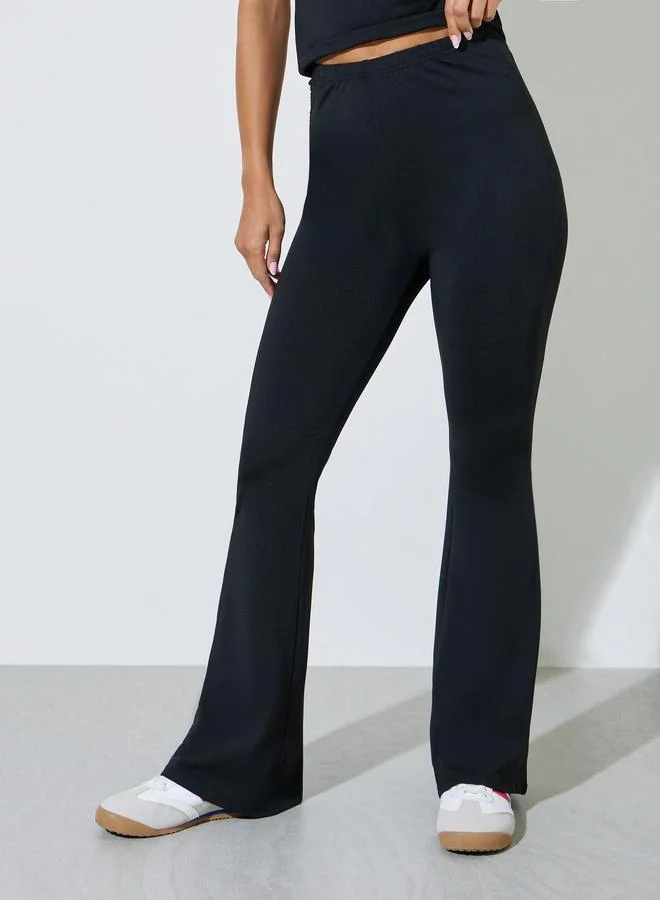 Styli  Black Solid Zip-Up High Neck Top and Leggings Co-Ord Set for Women | Best Price UAE