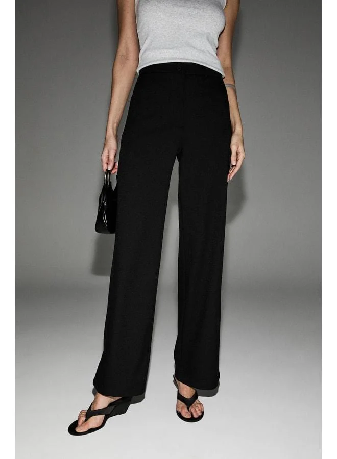 GRIMELANGE DESIR Women's Elastic Waist Wide-Leg Regular Fit Woven Black Pants.