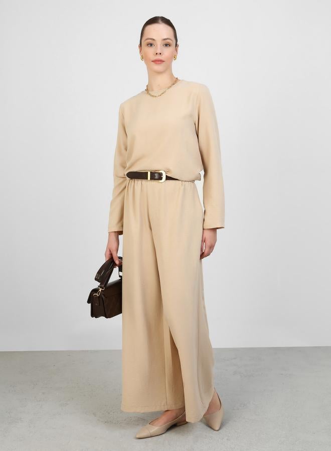 رفقة من مودانيسا طقم تونيك وبنطلون بيج سادة بياقة دائرية - Image 1