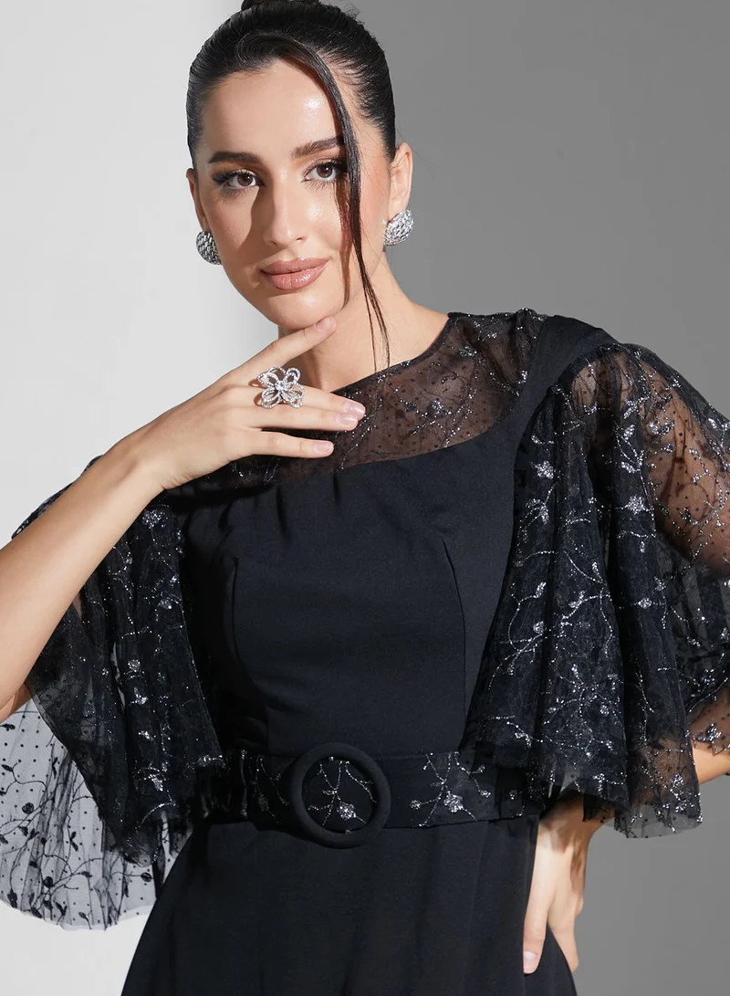 زينة لؤي X نمشي فستان بأجزاء شبكية