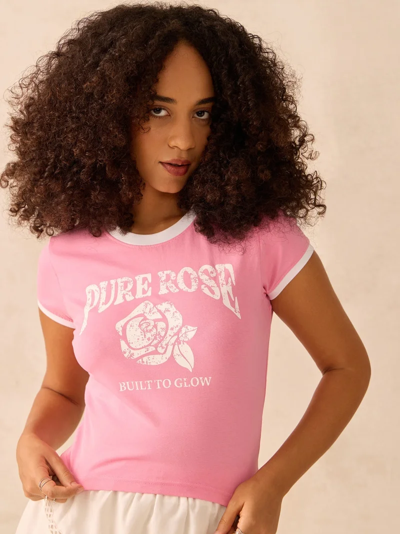Outzidr  Pink Raglan Cropped Top With Graphic Print for Women | Best Price UAE