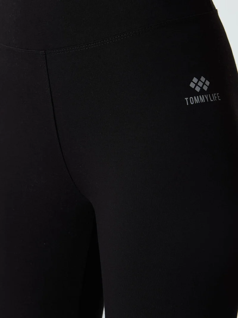 تومي لايف TOMMY High-Waist Capri Leggings