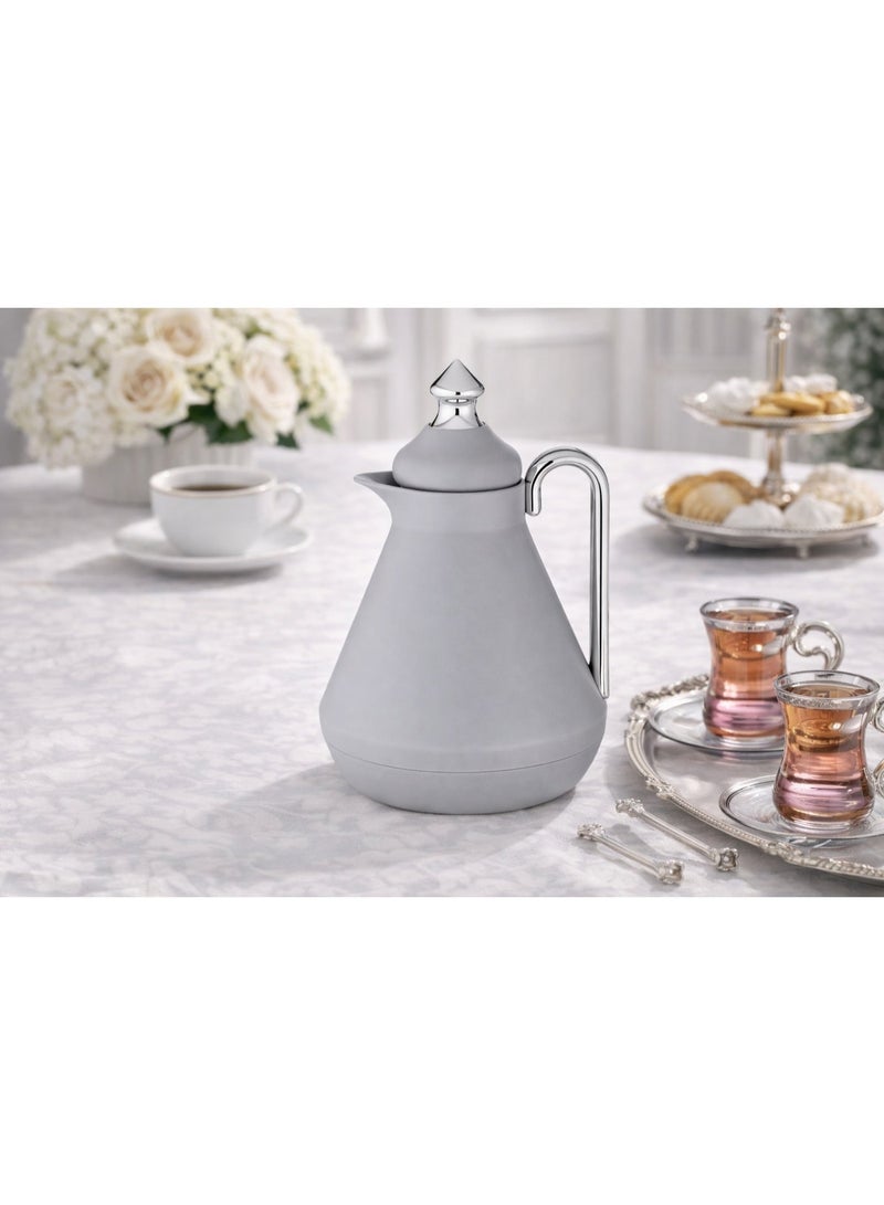 Host 🍃🫖 A luxurious 1-liter tea thermos in an elegant gray color with a shiny silver handle – a sophisticated touch for tea hospitality - Image 1