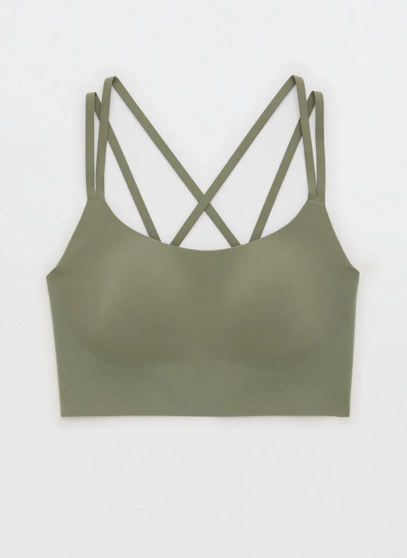 آري من امريكان ايجل Hold Up Sports Bra