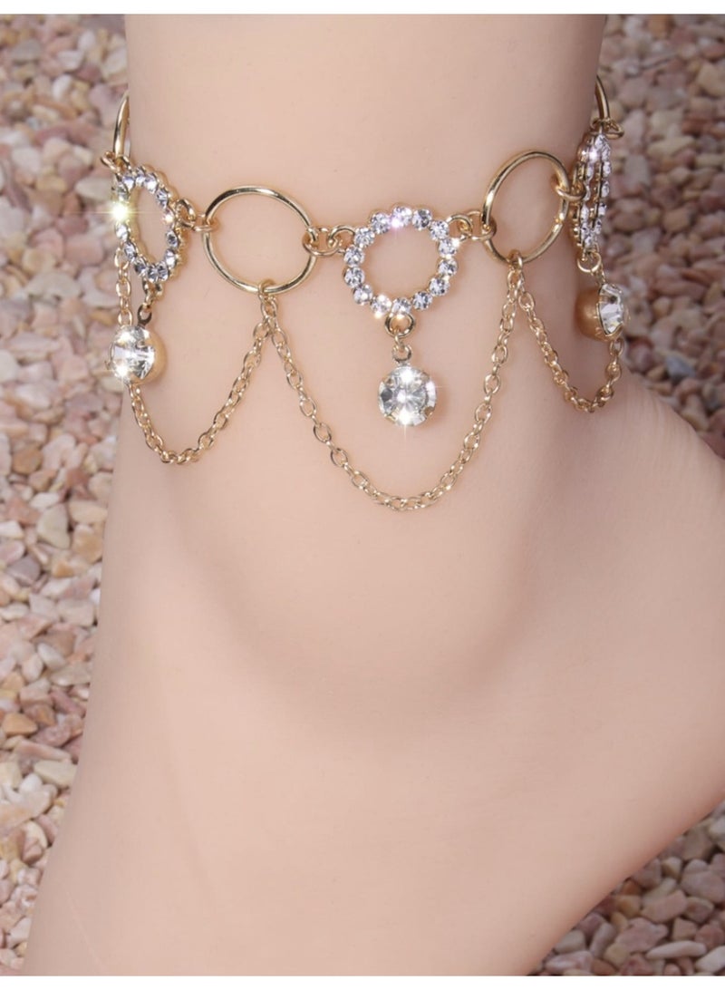 ڤيا خلخال متعدد الطبقات بتفاصيل راين لامعة تمنح القدم لمسة أنثوية راقية بلمعان هادئ. - Image 1