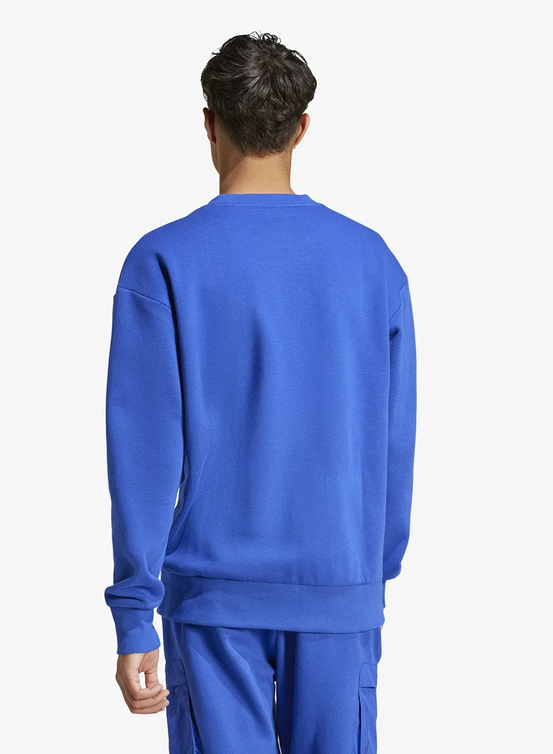 adidas سترة صوفية للهروب من المدينة