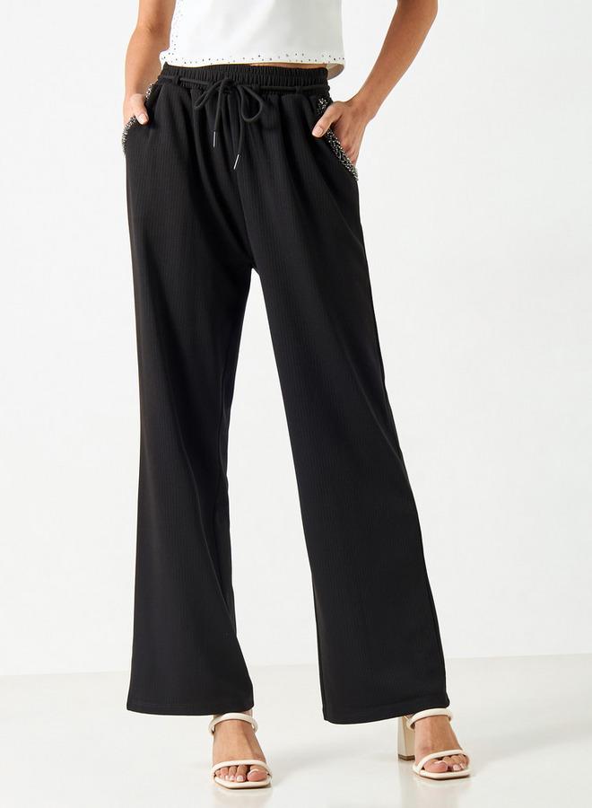 تواكستريمز بنطلون واسع السّاقين مزيّن برباط إغلاق من تو إكستريمز - Image 1