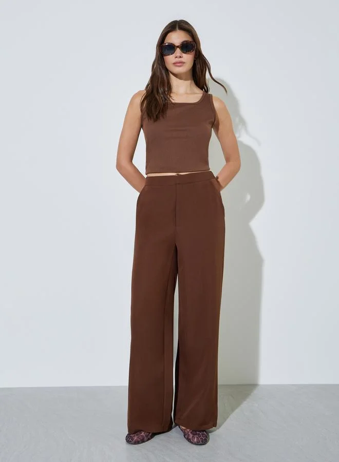 ستايلي Brown Solid Wide Leg Trousers