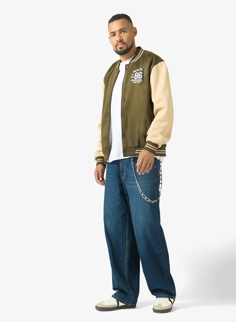Seventy Five  Classic Contrast Sleeve Snap Button Varsity Jacket for Men | Best Price UAE