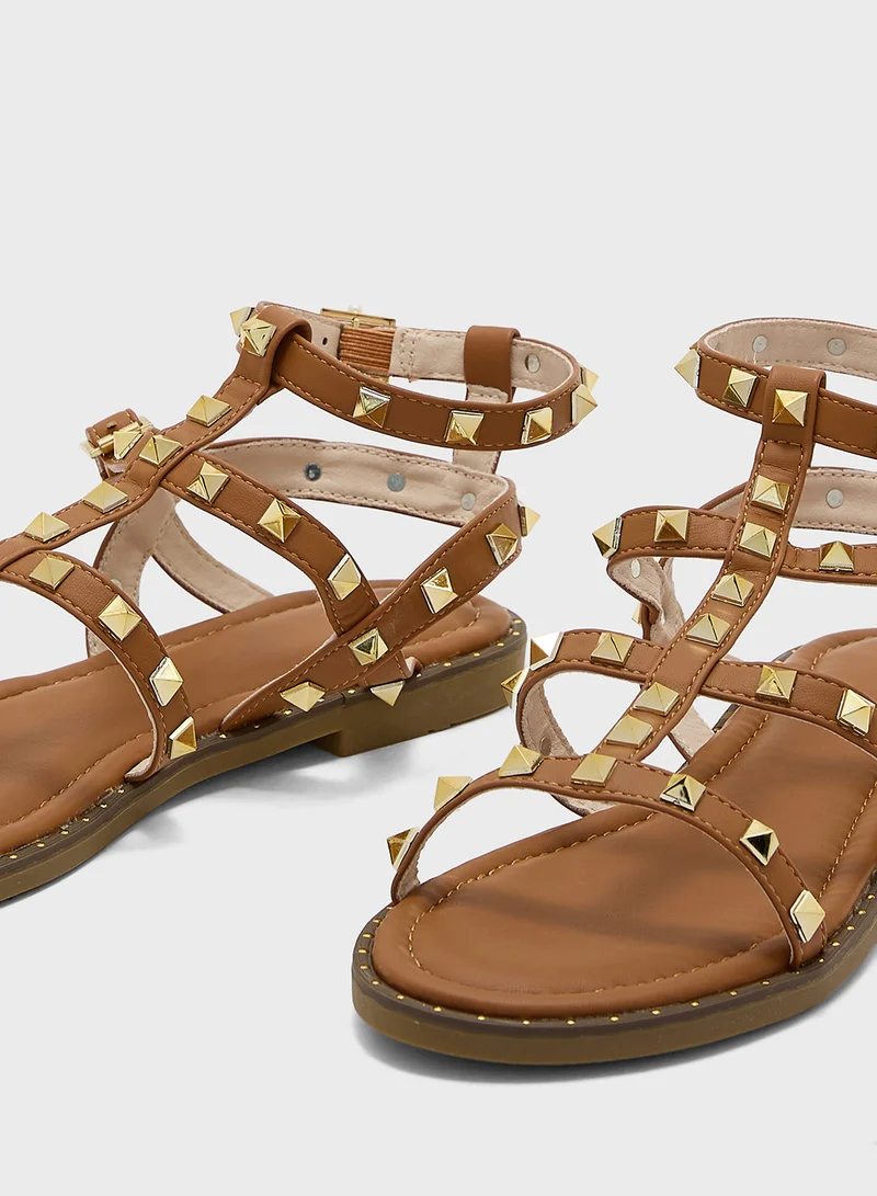 ترافل من نمشي Multi Strap Ankle Strap Stud Sandal