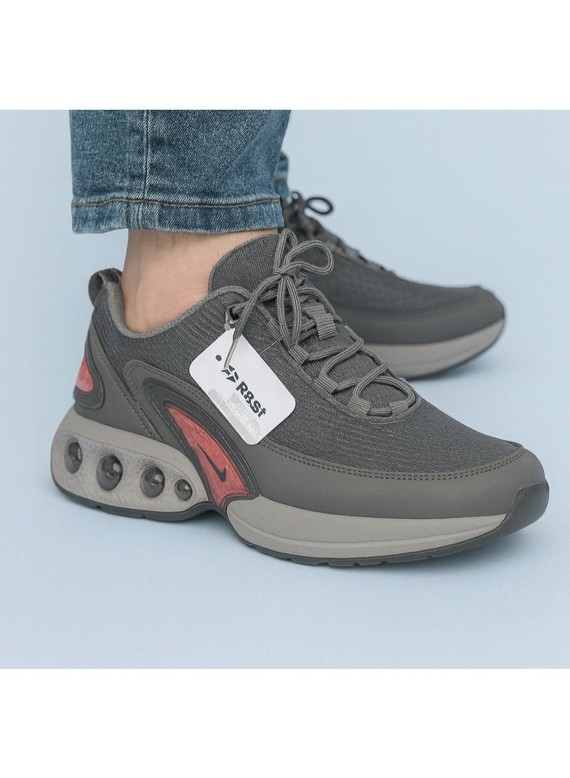 ريست حذاء رياضي رجالي من ريست بتصميم عصري ومريح مع وسادة هوائية - Image 2