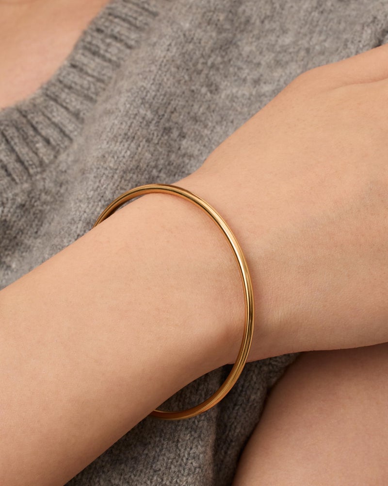 PAVOI 14K Yellow Gold Plated Bangle Bracelet for Women | Classic Lightweight Stacking Stainless Steel Bracelet | Medium/Large Size - Image 2