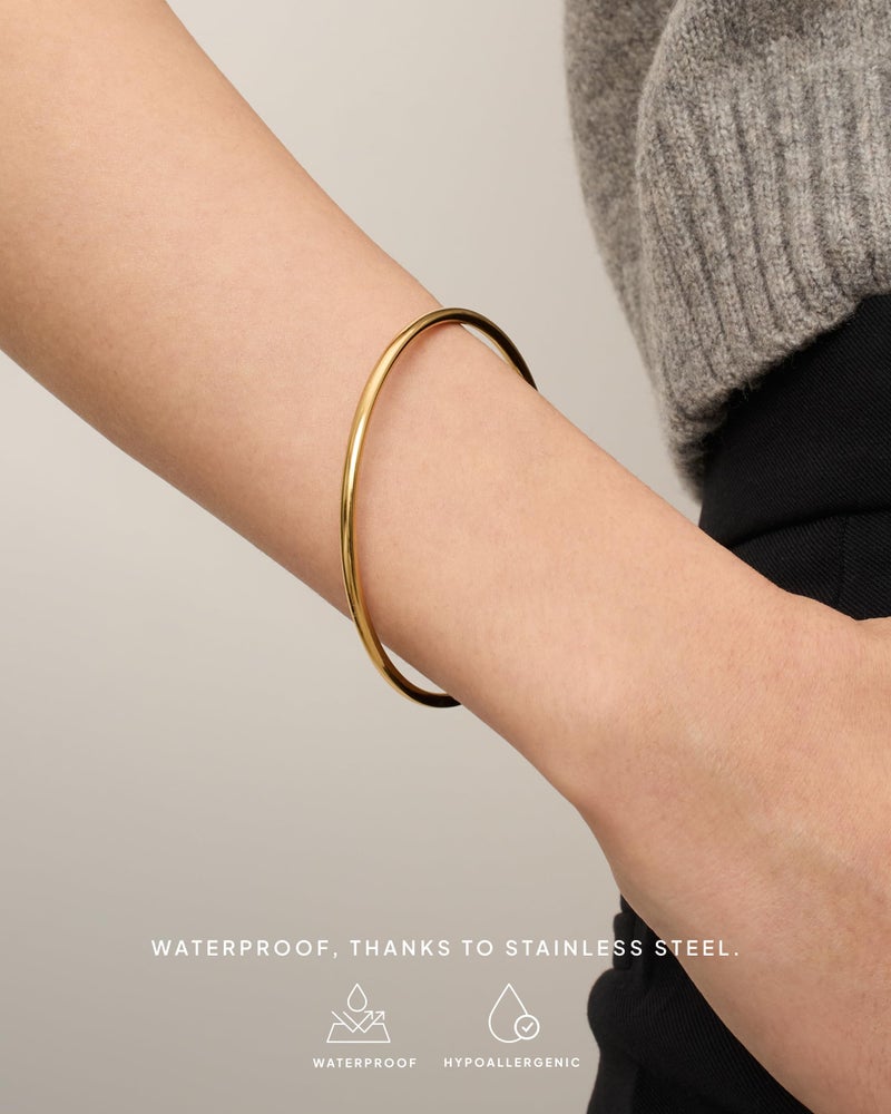PAVOI 14K Yellow Gold Plated Bangle Bracelet for Women | Classic Lightweight Stacking Stainless Steel Bracelet | Medium/Large Size - Image 4