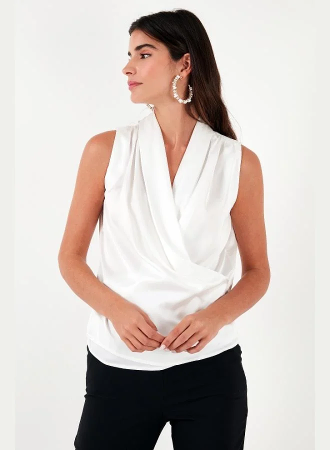 ليلا بلوزة ليلا بدون أكمام بياقة ملتفة للنساء