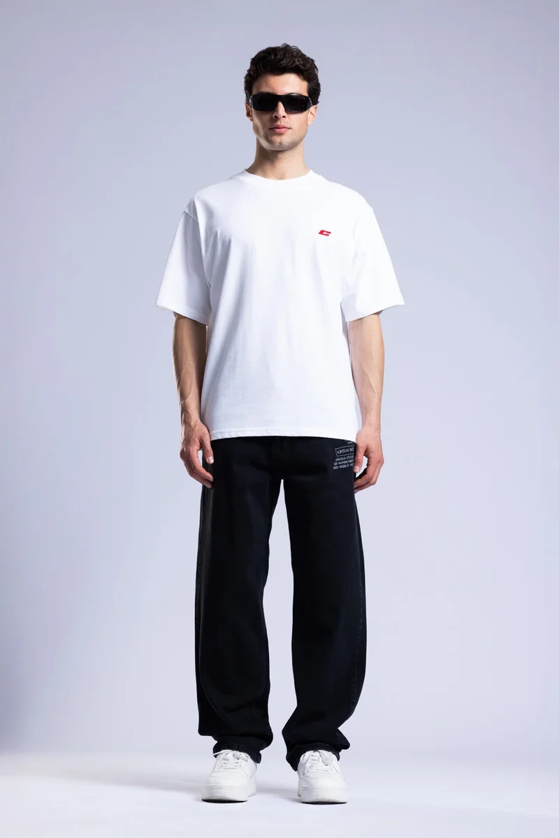 كاتش بنطلون جينز فضفاض مطبوع