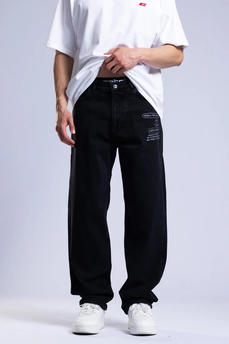 كاتش بنطلون جينز فضفاض مطبوع