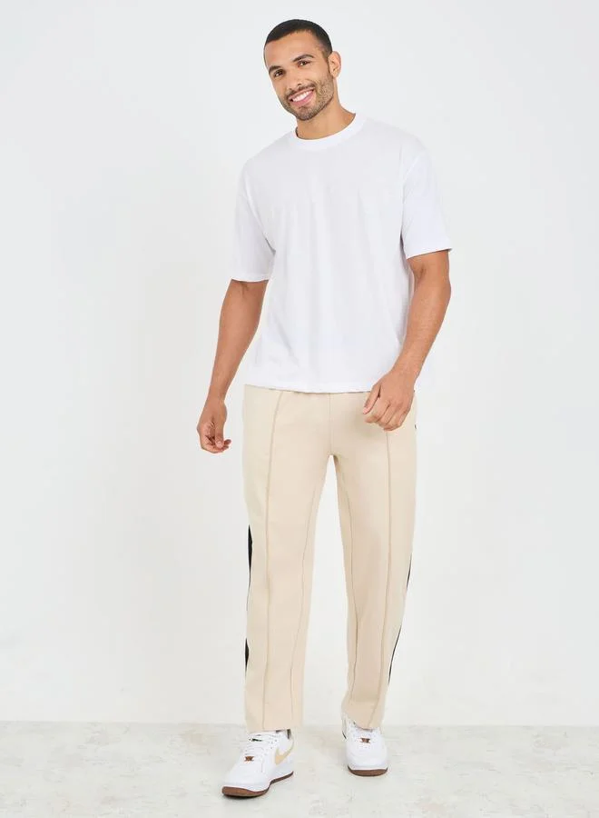 ستايلي Side Contrast Open Hem Relaxed Fit Joggers with Zip Pockets