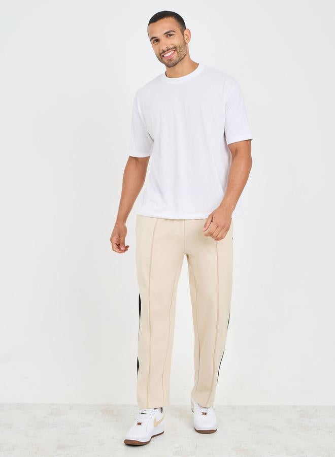 ستايلي بنطلون جوجر بقصة مريحة وفتحات جانبية وجيوب بسحاب - Image 2