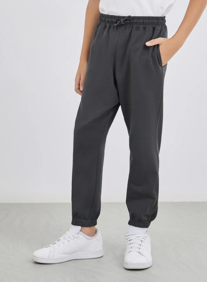 ستايلي Styli Charcoal Solid Cuffed Joggers with Slip Pockets
