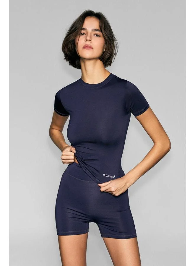 URBAN BEAT FLEXORA Women's Round-Neck Print-Detail Slim-Fit Sports T-Shirt in Purple.
