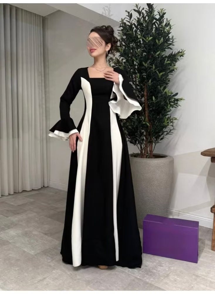 كيوتي فستان نسائي طويل بفتحة صدر مربعة وتصميم متباين الألوان - أسود وأبيض. - Image 1