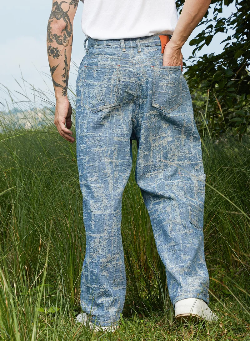 Campus Sutra Campus Sutra Men's Light Blue Textured Baggy Denim Jeans For Casual Wear | Light-Wash | Low-Rise | Button Closure | Denim Jeans Crafted With Comfort Fit For Everyday Wear