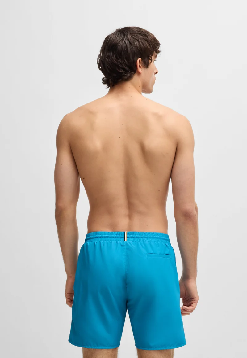 بوس شورت سباحة سريع الجفاف بتفاصيل متباينة